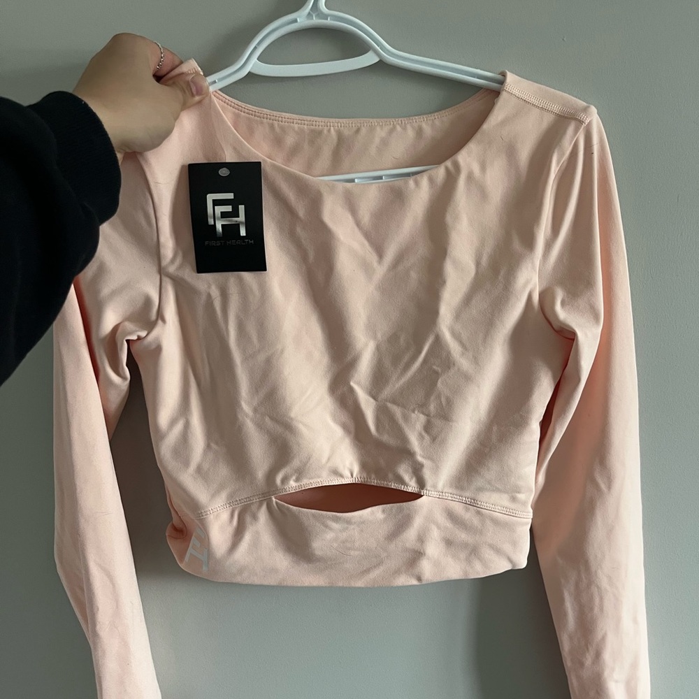 Pink long sleeve first health apparel shirt